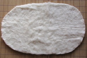 Mollettone di cotone bio tagliato secondo la forma del tapponcino.